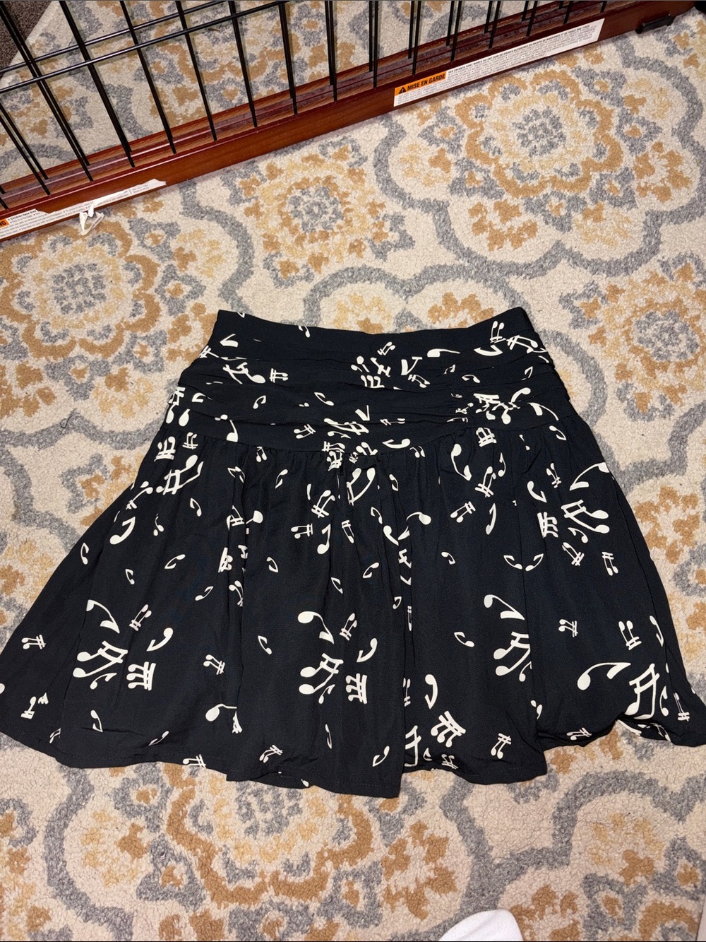 Black and white mini skirt with music notes